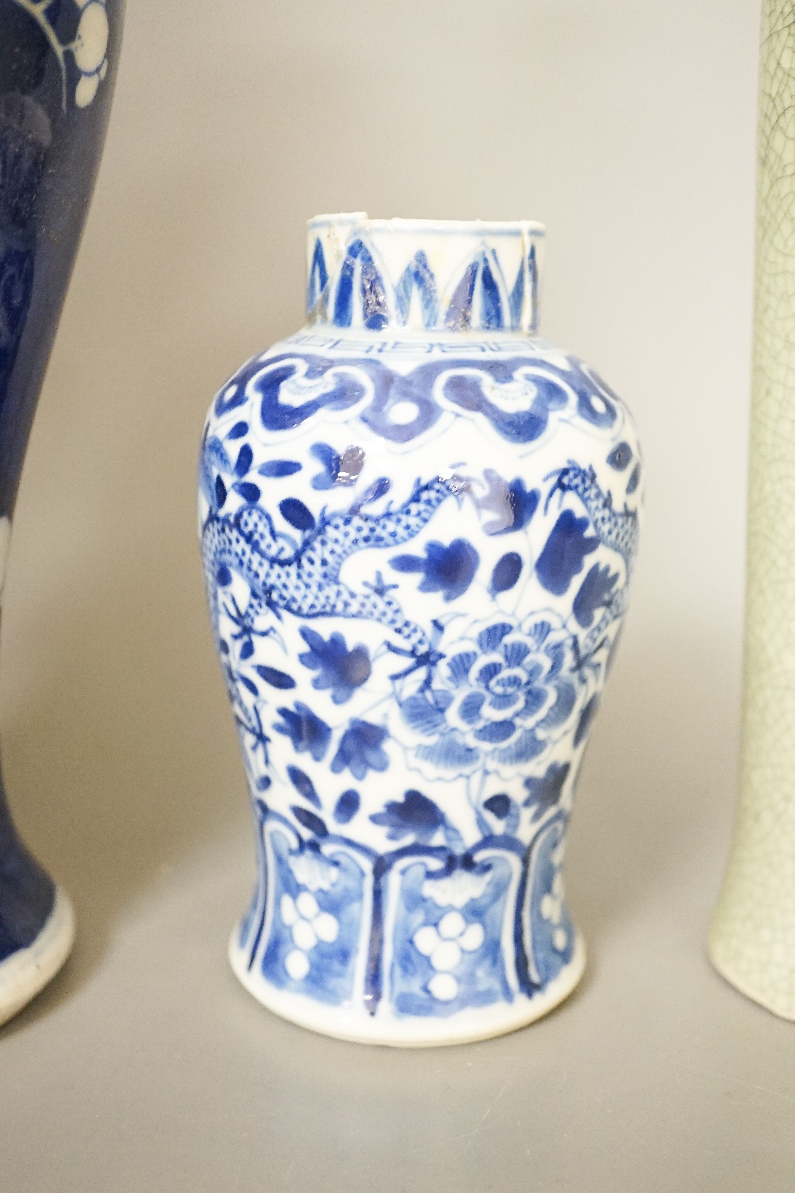 Two Chinese blue and white vases and a slender crackle glaze vase, Qing and later 30cm